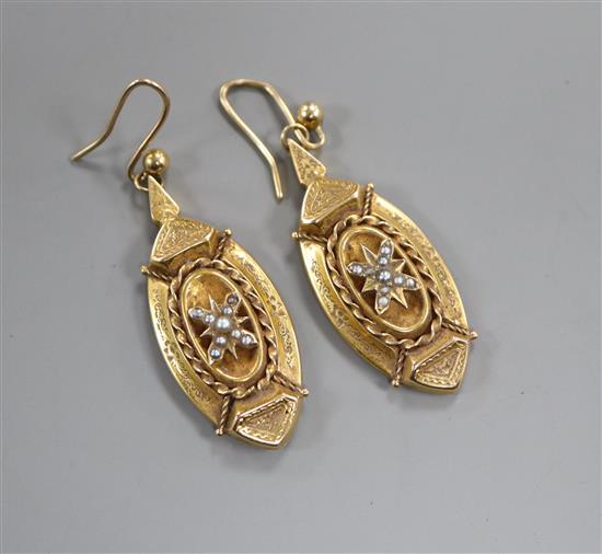 A pair of Victorian yellow metal and split pearl set navette shaped drop earrings, 38mm.